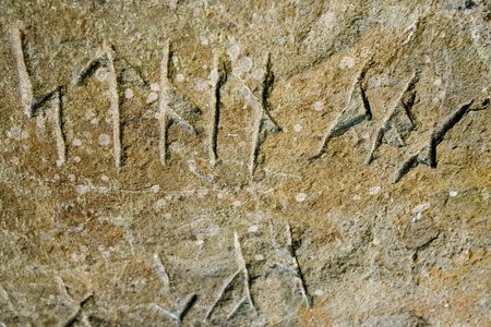 Viking runes inscribed in a stoneの写真素材