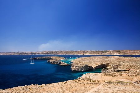 Landscape of Comino Island (foreground) and Gozo Island (background) in maltaの写真素材