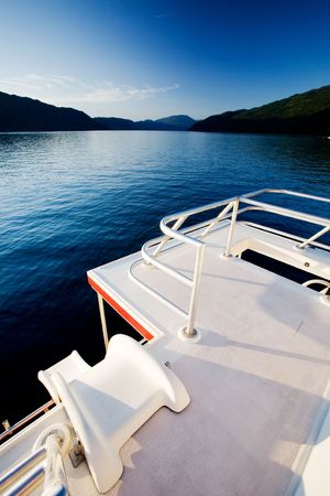 A slide off a luxury  boat into a beautiful lakeの写真素材