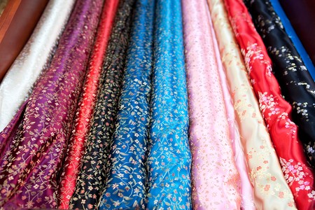 A collection of asian cloth on the rollの写真素材