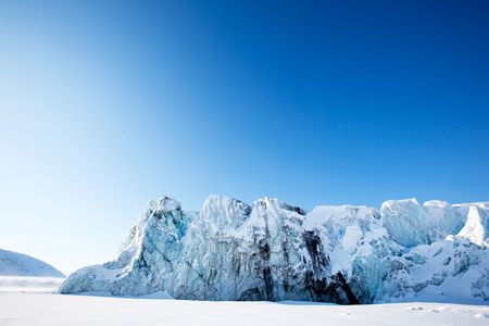 A glacier on the coast of Spitsbergen, Svalbard, Norway.の写真素材