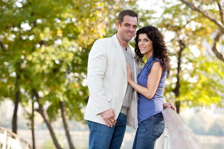 A couple looking at the camera and smilingの写真素材