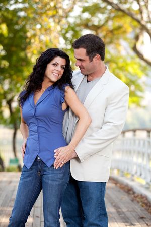 A portrait of a happy couple in the park の写真素材