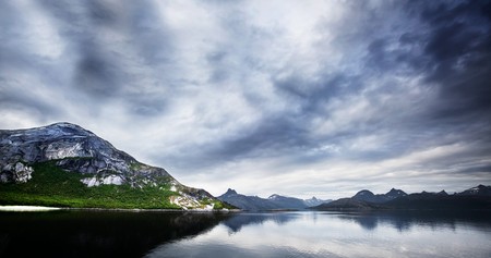 A panorama of mountains and ocean in Norwayの写真素材