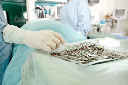 A detail image of sterile surgery instruments in an operation roomの写真素材