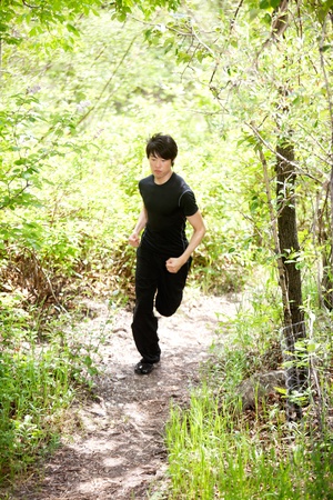 Man jogging during morning walk against blur backgroundの写真素材