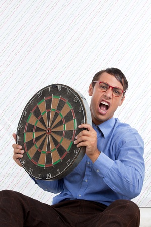 Retro Styled Man holding a dartboard の写真素材