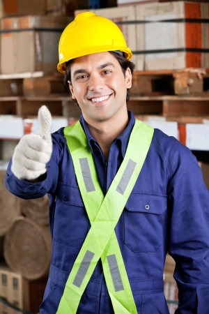 Confident Foreman Gesturing Thumbs Up Confident Foreman Gesturing Thumbs Up