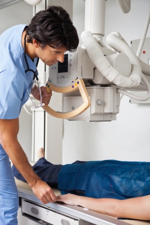 Technician Taking Patient s X-rayの写真素材