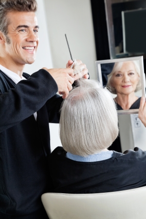 Hairdresser Cutting Client s Hairの写真素材