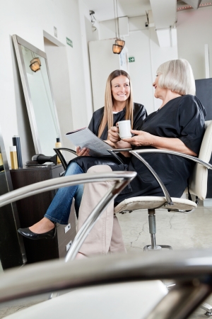Female Customers Waiting In Hair Salonの写真素材