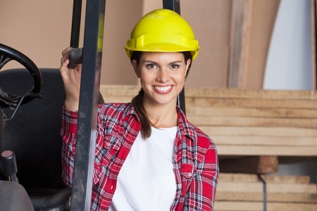 Female Architect In Hardhat By Forktruckの写真素材