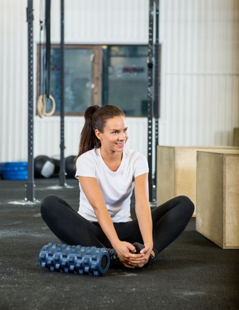 Woman Exercising At Gymの写真素材