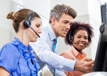 Manager Explaining To Employees In Call Centerの写真素材
