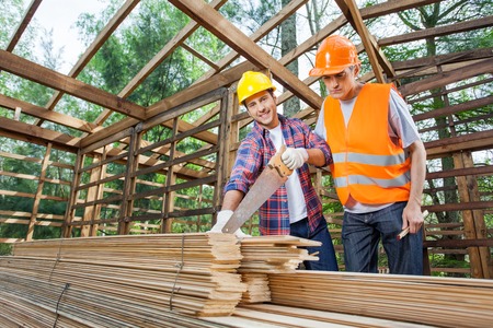 Male Construction Workers Working At Site
