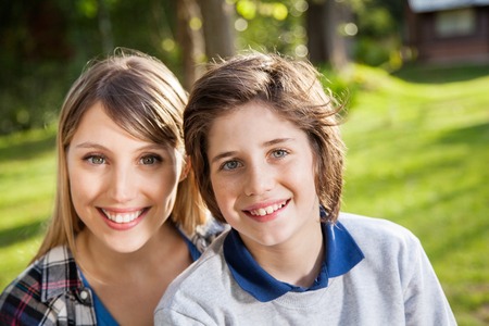 Happy Mother And Son At Campsite