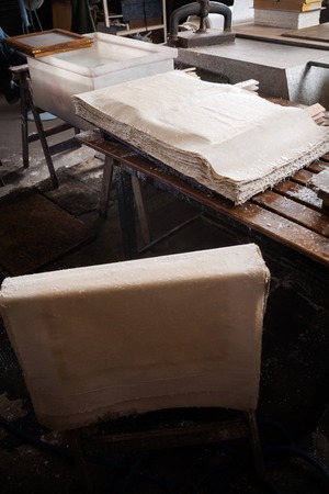High angle view of papers drying in factoryの写真素材