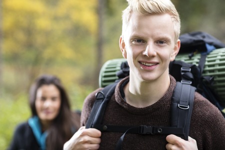 Portrait Of Confident Male Hiker In Forestの写真素材