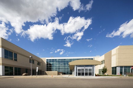 Modern Hospital Building Against Skyの写真素材