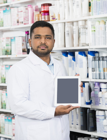 Chemist Holding Digital Tablet With Blank Screenの写真素材