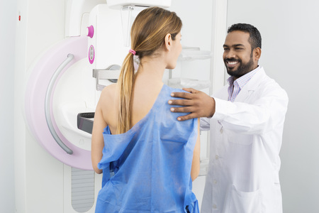 Doctor Preparing Patient For Mammogram Testの写真素材
