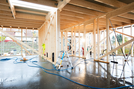 Wooden Incomplete Building With Wet Floorの写真素材