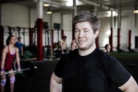 Confident Man Smiling In Fitness Centerの写真素材
