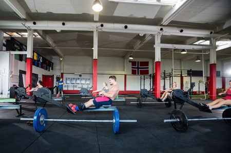Clients Using Machines In Fitness Centerの写真素材