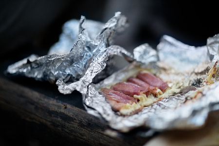 Closeup Of Cooked Meat In Aluminum Foilの写真素材