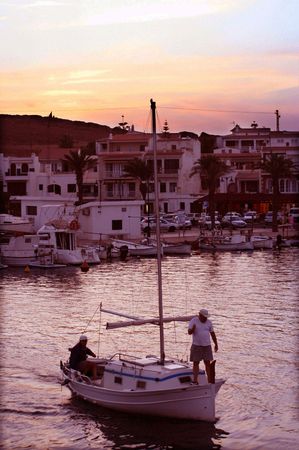 fishermen coming home after a days fishingの写真素材