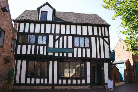 old tudor building with its wooden detailsの写真素材