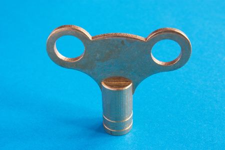 radiator key over a blue backgroundの写真素材