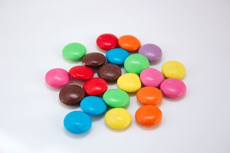 colourful candy beans over a white backgroundの写真素材