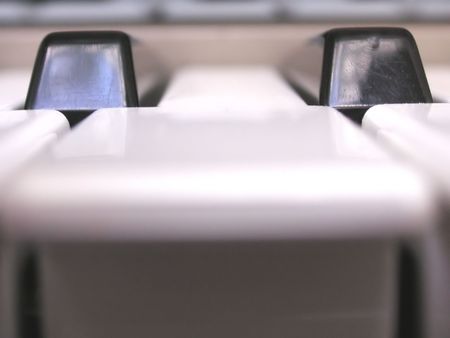 abstract shot of a key on a keyboardの写真素材