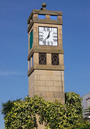 clock tower against a blue skyの写真素材