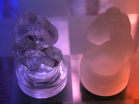 abstract knight pieces of  a glass chess setの写真素材