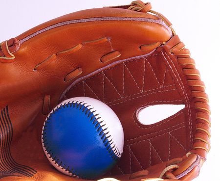 baseball inside a baseball gloveの写真素材
