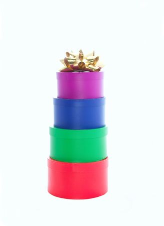 assorted stacked gift boxes and ribbons isolatedの写真素材