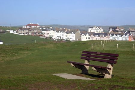 bench on a green a place to be aloneの写真素材