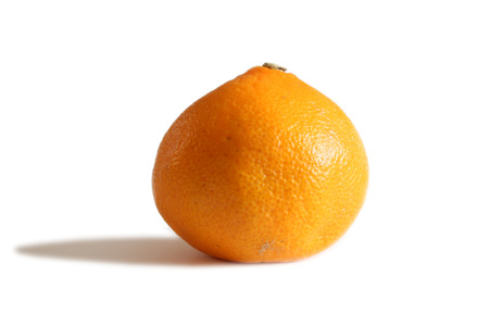 fresh orange isolated over a white backgroundの写真素材