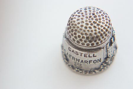  silver thimble against a light backgroundの写真素材