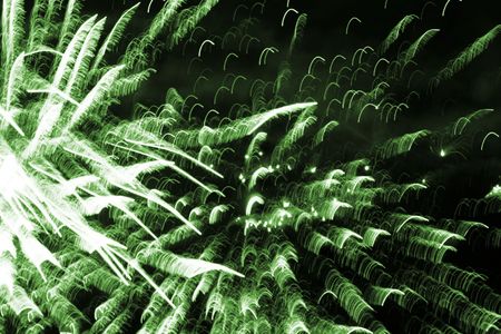 background with green flashes on a dark backgroundの写真素材