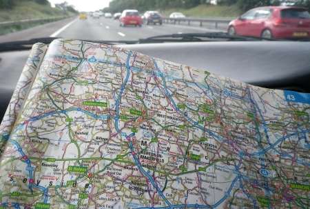 navigating via a road map whilst on route of a journey