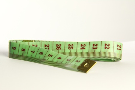 green tapemeasure for use in most fabric industries and weight lossの写真素材