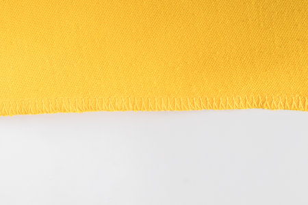 Abstract fabric background, yellow fabric cloth background textureの写真素材