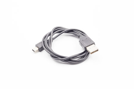 USB cable for smartphone on white background, Black usb cable on white background, computer peripherals connector or smartphone recharge supplyの写真素材