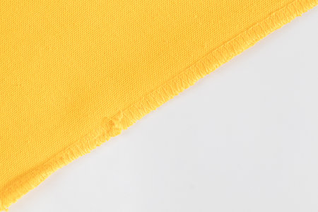 Abstract fabric background, yellow fabric cloth background textureの写真素材