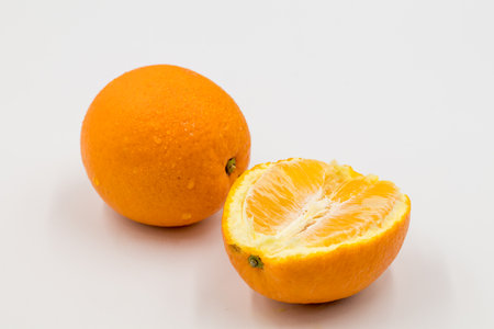 Fresh orange fruit isolate on white background, ripe orange isolated on white backgroundの写真素材