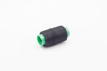 Colorful Spool of sewing thread, spool of industrial threads, Colored spools of thread on a white...