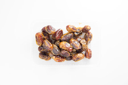 Sweet fresh dates on white background, Dried dates fruit on white backgroundの写真素材